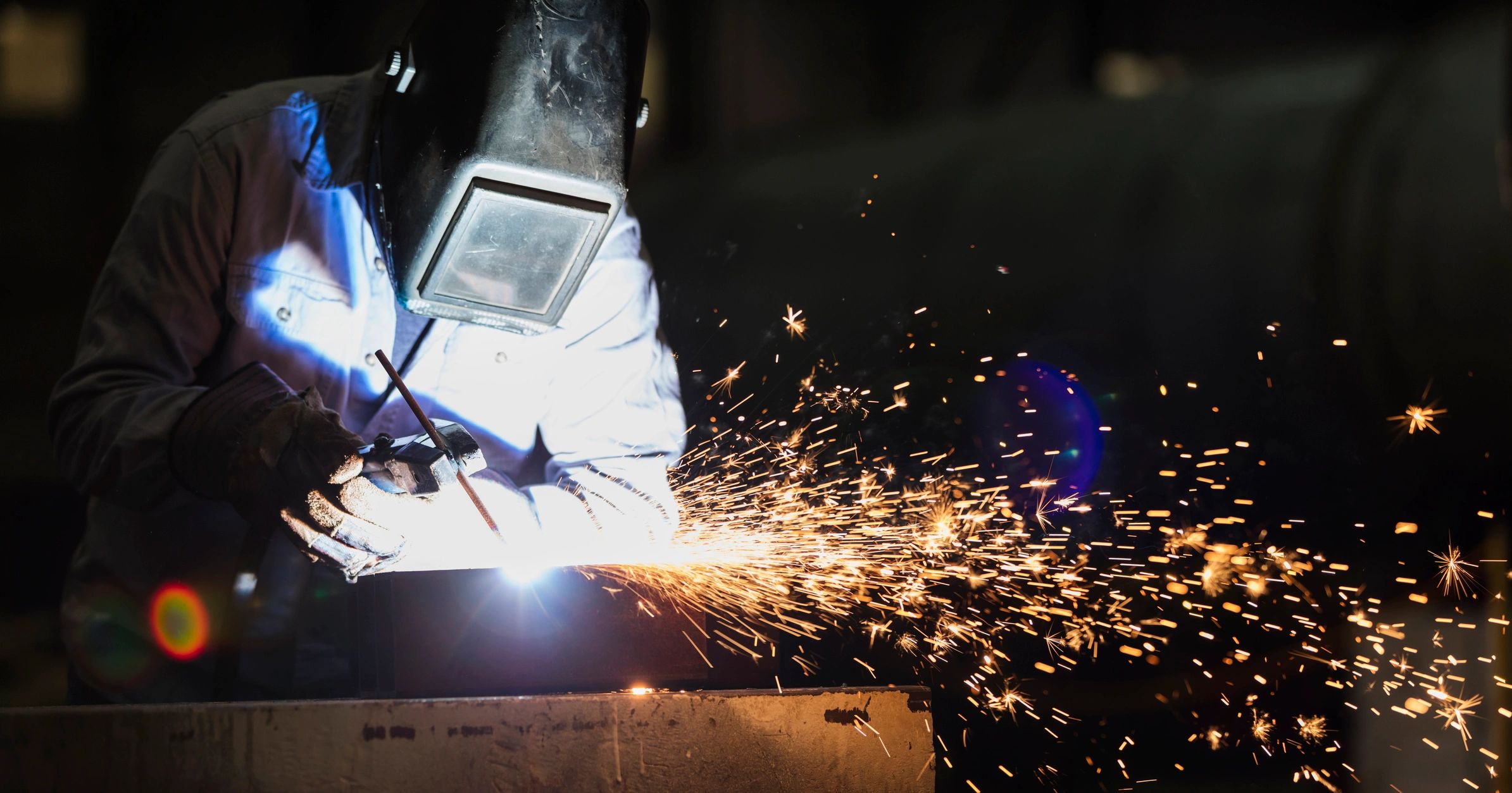 Experienced welder working in a fabrication facility