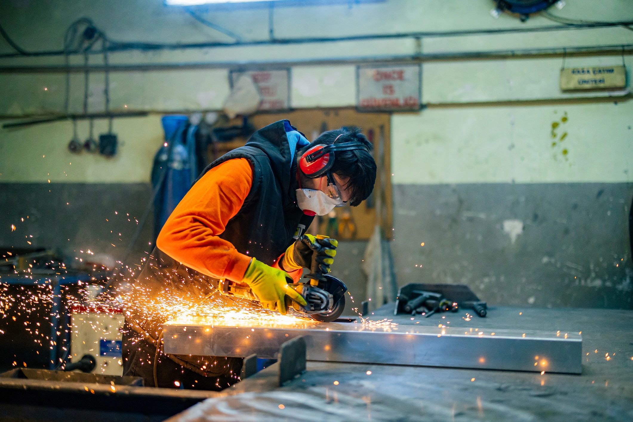 Metalworking with angle grinder creating sparks