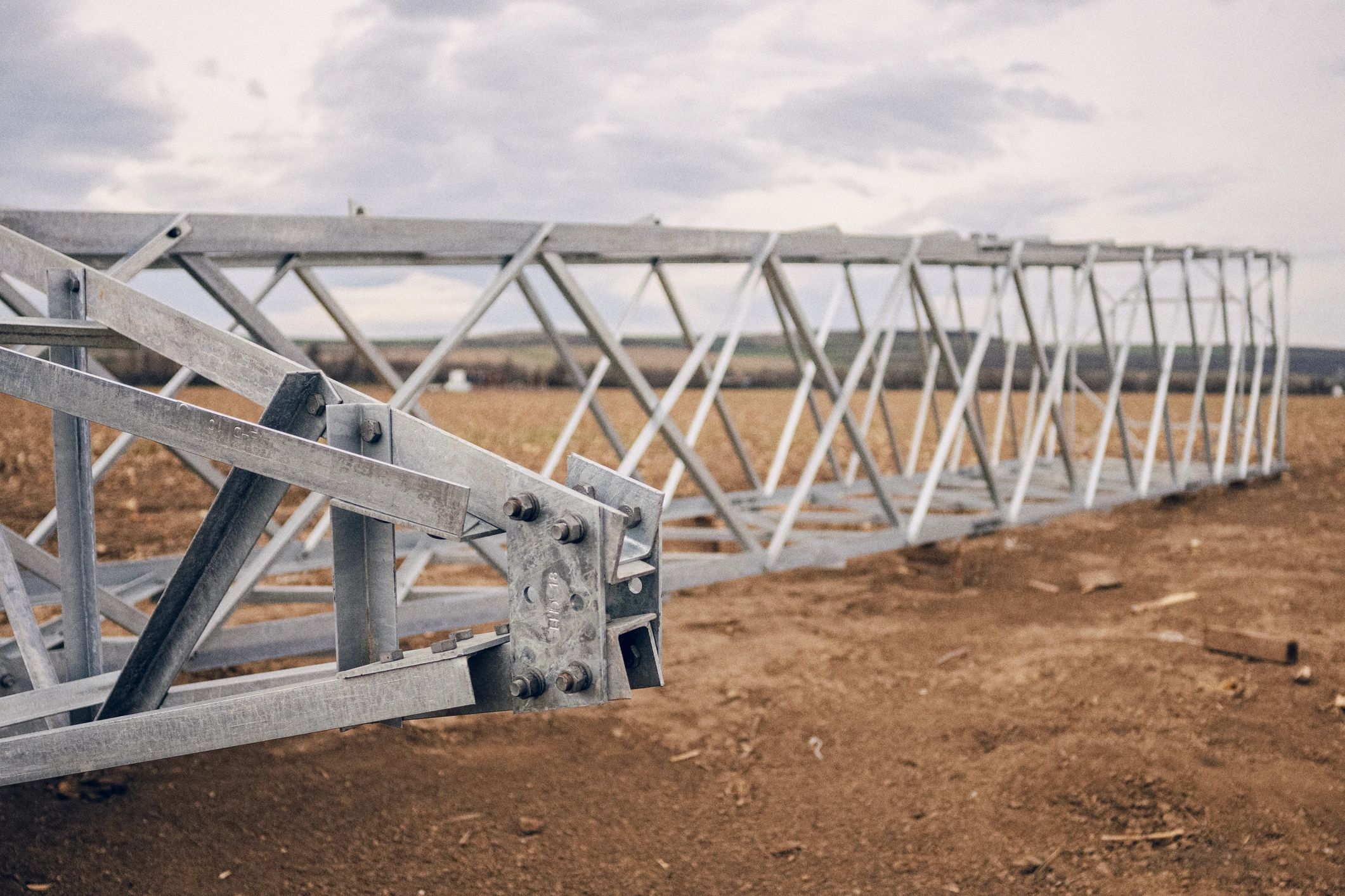 Steel structure components staged for fabrication and installation